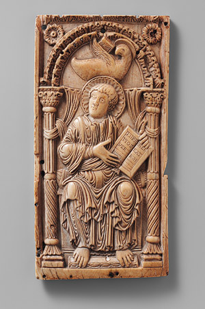 An example of early Carolingian art made on elephant ivory, "Plaque with Saint John the Evangelist", early 9th century, Aachen, Germany. (Photo: Cloisters Collection)