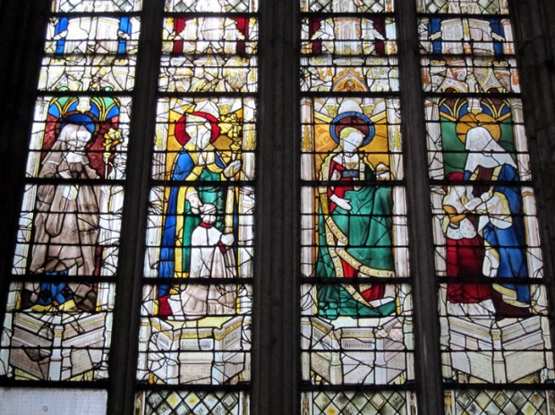 16th century stained glass windows of four saints 