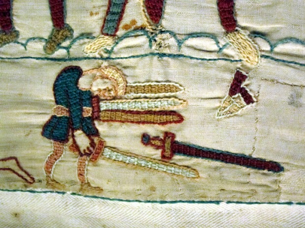 collecting swords, Bayeux Tapestry