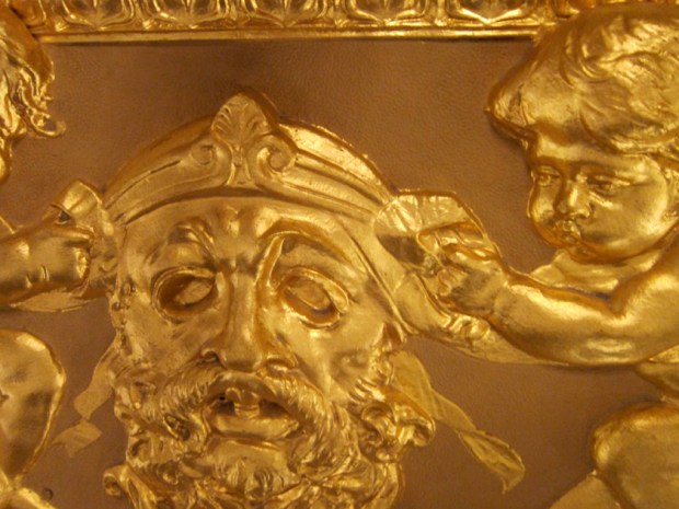 mask and cherub detail